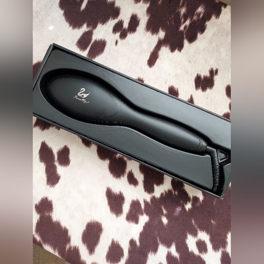 Hair straighting brush